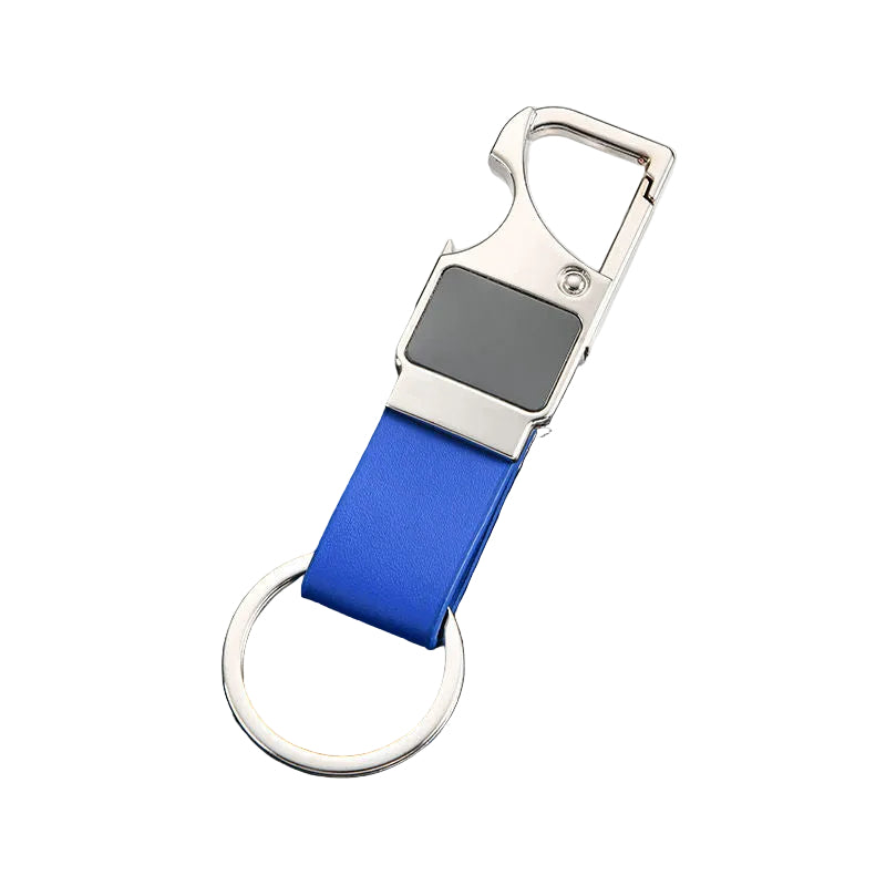 Keychain with black strap and silver clip on a dark textured surface